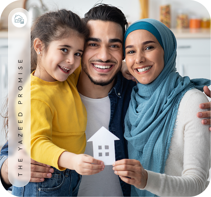 Family holding a house
